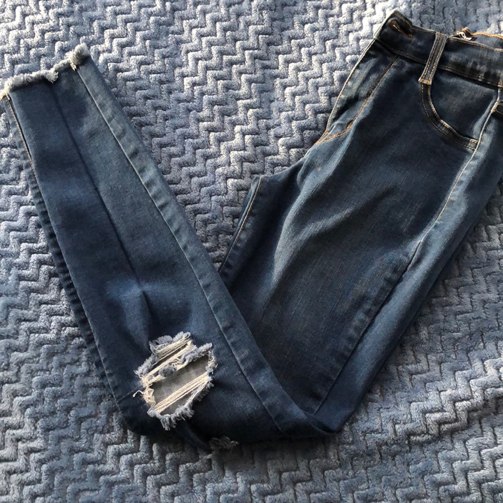 Ripped Dark Blue Jeans